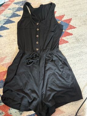 Sleeveless Black Button-Front Romper with Waist Tie